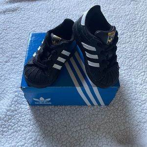 New black superstar adidas